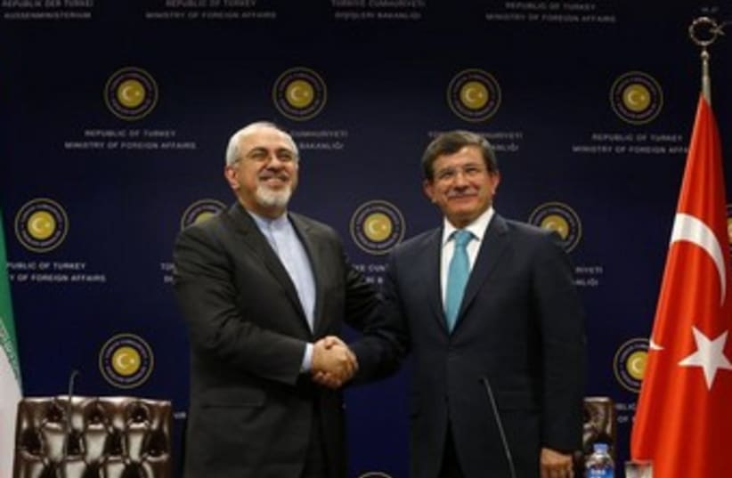 Iran FM Zarif and Turkish FM Davutoglu 370 (photo credit: REUTERS/Umit Bektas )