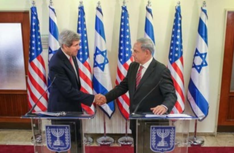Kerry and Netanyahu shake hands at press conference 370 (photo credit: Noam Moskowitz/Pool)