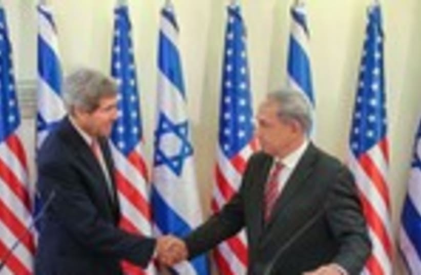Kerry and Netanyahu shake hands at press conference 150 (photo credit: Noam Moskowitz/Pool)