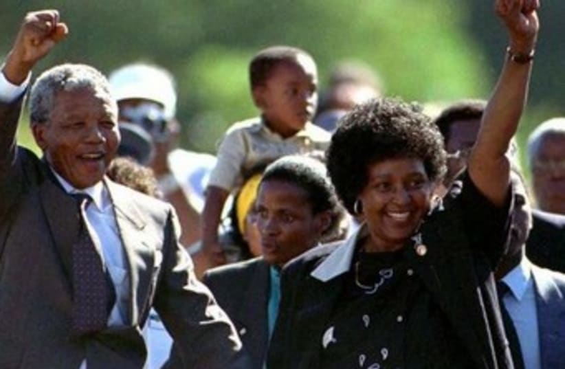 Nelson Mandela and his wife Winnie after his prison release (photo credit: REUTERS)