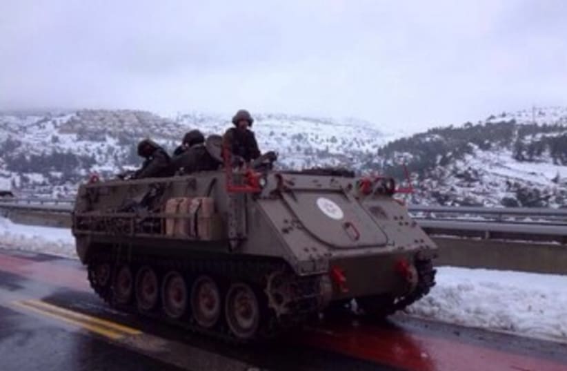 Snow relief efforts tank 370 (photo credit: Courtesy)