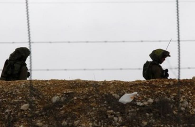 IDF soldiers on Lebanon border 370 (photo credit: REUTERS/Ali Hashisho )