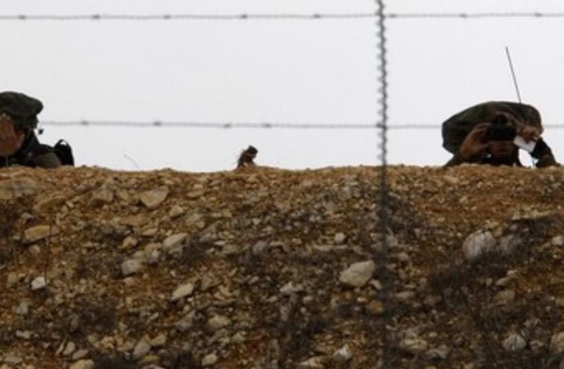 IDF soldiers on Lebanon border 3 370 (photo credit: REUTERS/Ali Hashisho )