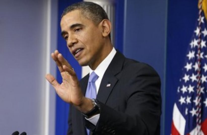 US President Barack Obama gestures during news conference 37 (photo credit: REUTERS)