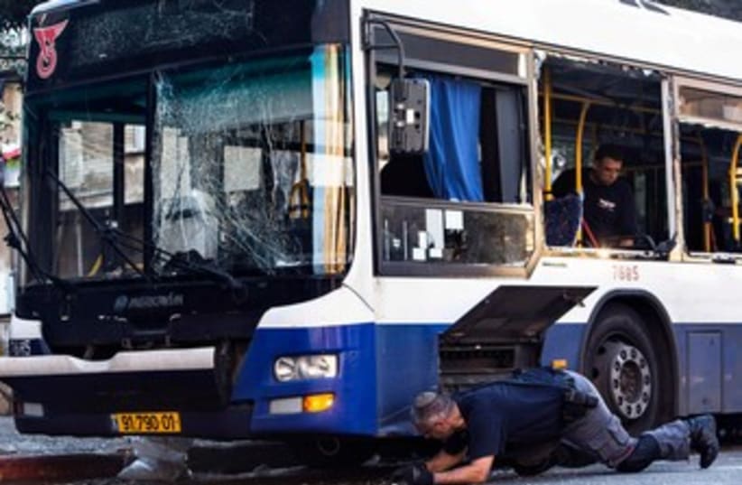 Bat Yam bus bombing 370 (photo credit: REUTERS/Nir Elias)