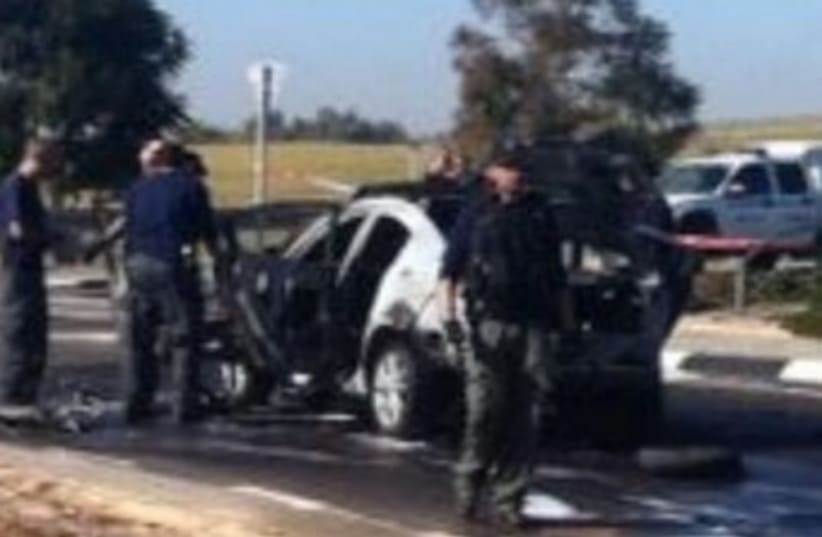 Car explosion scene in Rehovot 370 (photo credit: Courtesy Israel Police)