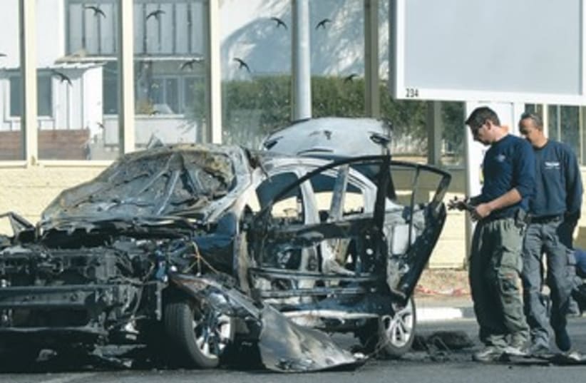 Car bomb in Rehovot, Dec 2013 (photo credit: flash 90)