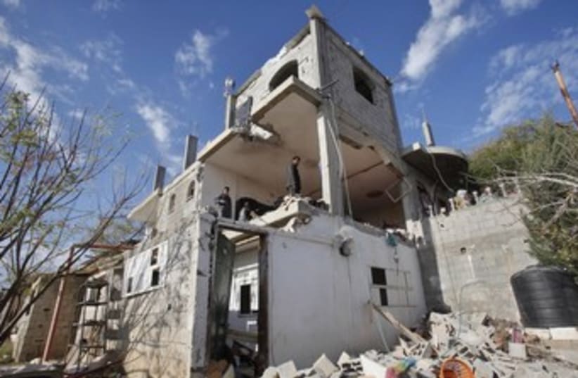 Gazan house damaged in IAF strike 370 (photo credit: REUTERS)