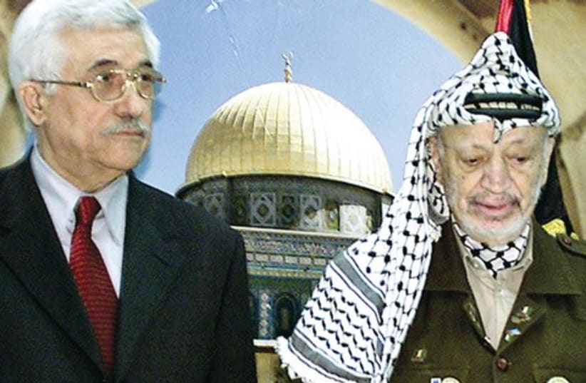 Mahmoud Abbas and Yasser Arafat in Ramallah in 2003. (photo credit: REUTERS)