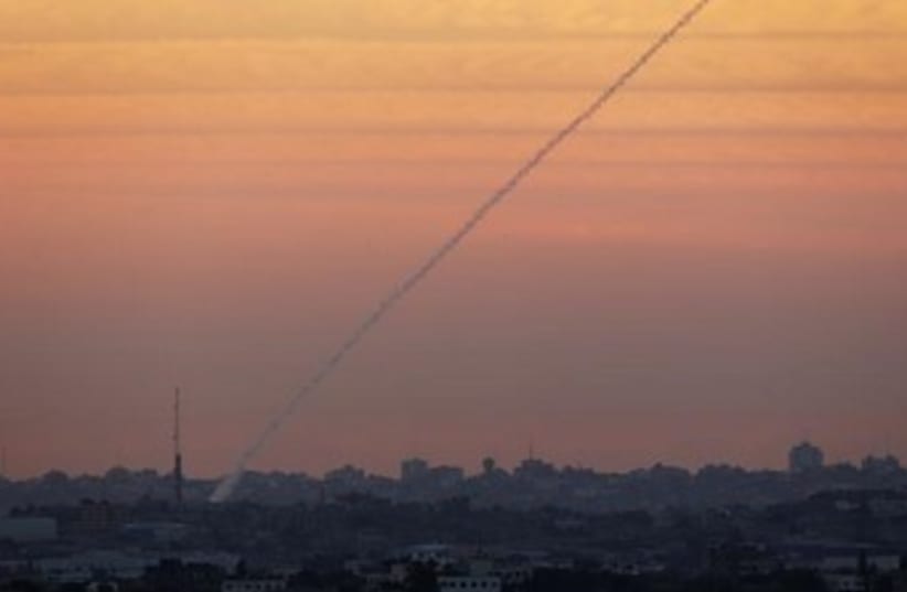 Gaza rocket at sunset  (photo credit: REUTERS/ Darren Whiteside)