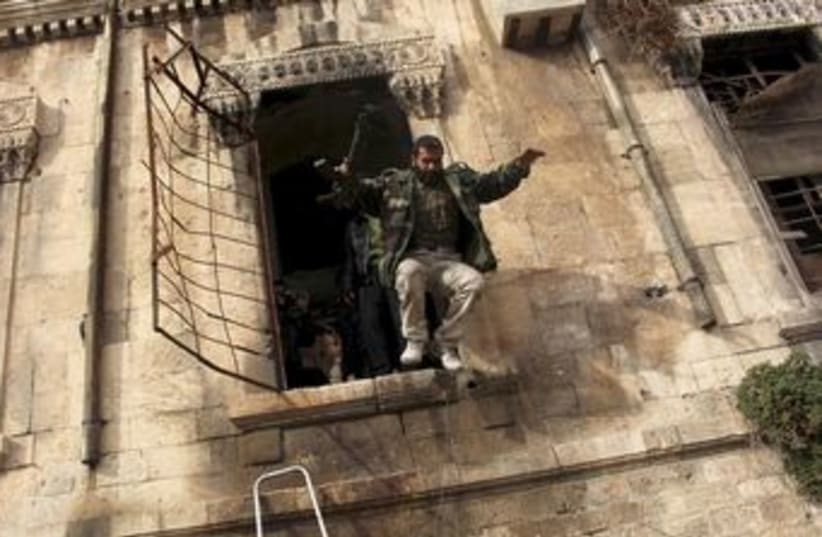 A Free Syrian Army fighter in Aleppo (photo credit: REUTERS)