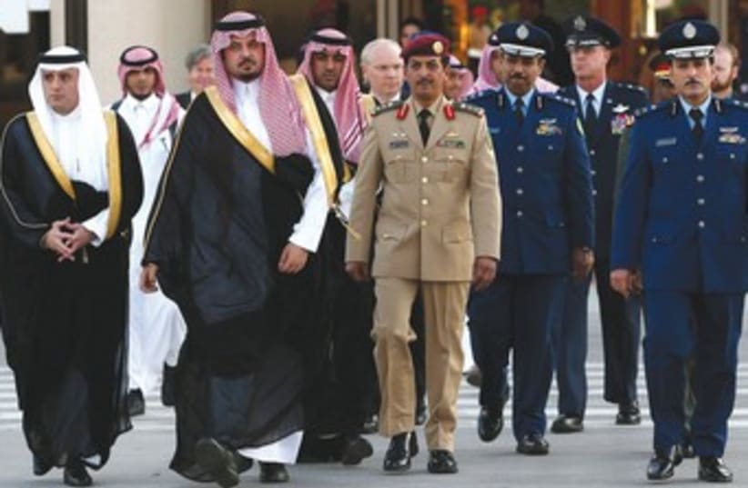 A Saudi delegation greeting US Secretary of Defense Hagel. (photo credit: REUTER)