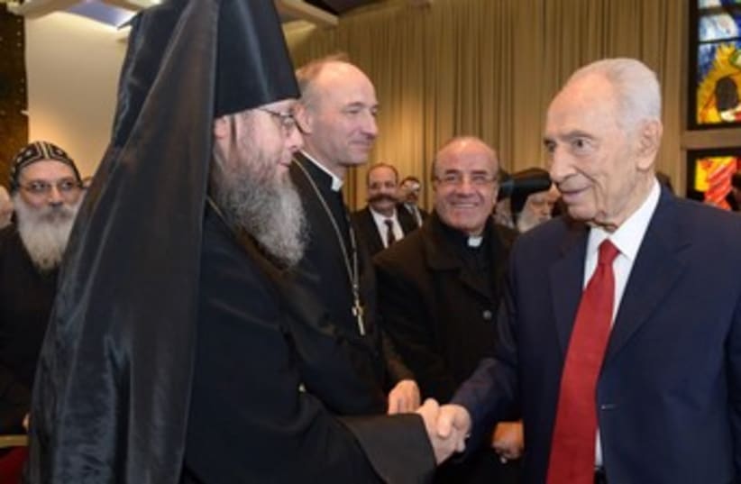President Shimon Peres greets Christian leaders in Jerusalem (photo credit: Mark Nieman / GPO)
