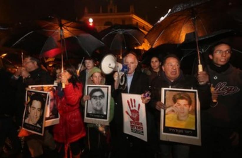 Bereaved families protest prisoner release. (photo credit: Marc Israel Sellem/The Jerusalem Post)
