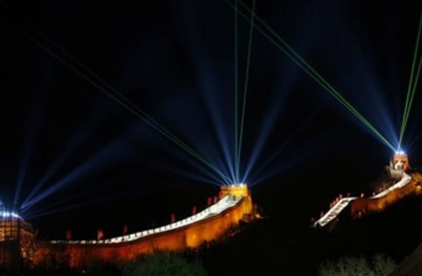 Lasers usher in the new year at the Great Wall in China (photo credit: Reuters)