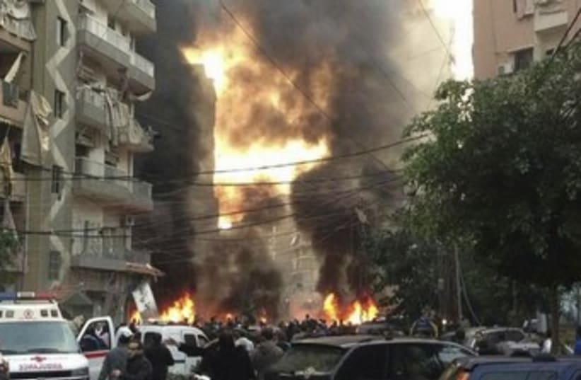 The site of a blast in Beirut's southern suburbs. (photo credit: REUTERS/Jamal Sahili)