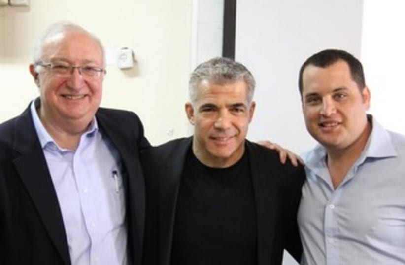Professor Michael Trajtenberg, Yair Lapid and Ori Reshtick (photo credit: The National Union of Israeli Students)