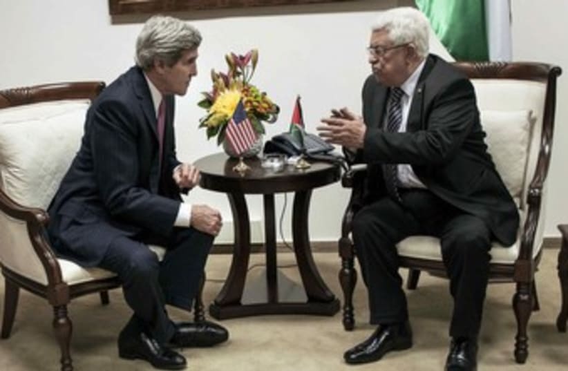 John Kerry and Mahmoud Abbas. (photo credit: Reuters)
