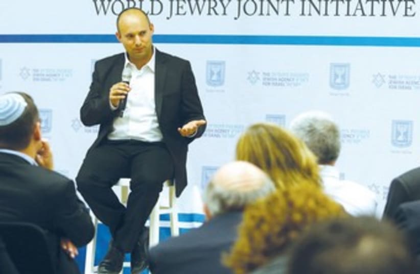 Naftali Bennett speaks to a forum on planning issue. (photo credit: Marc Israel Sellem/The Jerusalem Post)