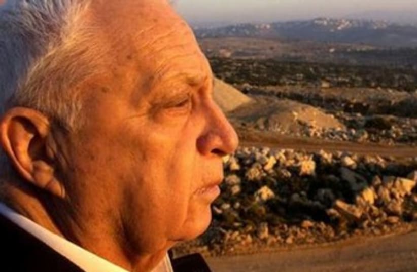 Former Israel prime minister Ariel Sharon gazes at the West Bank  (photo credit: Reuters)