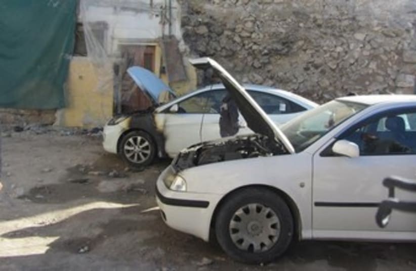 Cars burned in price tag attack Wednesday morning. (photo credit: B'Tselem)