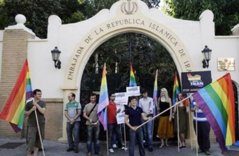 Spanish LGBT organization demonstrate against Iran's human rights violations outside Iranian embassy in Madrid, 2009. (photo credit: REUTERS/Susana Vera)