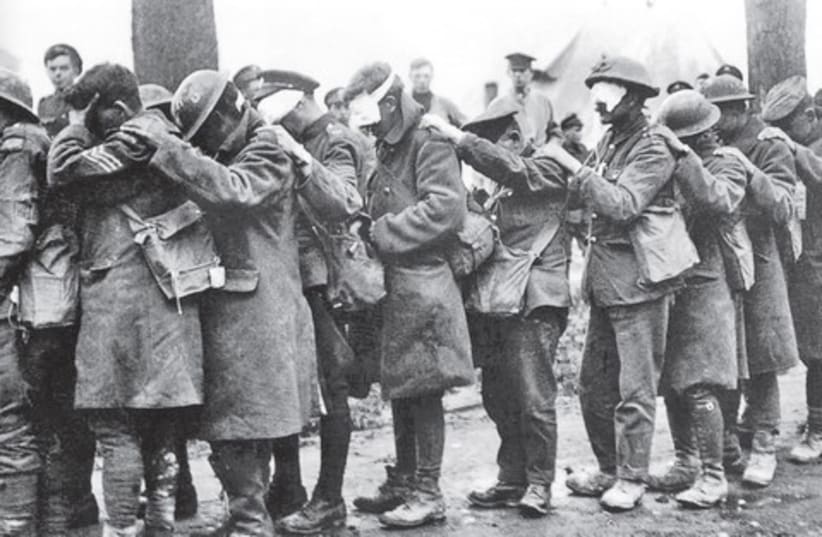 British 55th Division gas casualties are photographed on April 10, 1918. (photo credit: Wikimedia Commons)