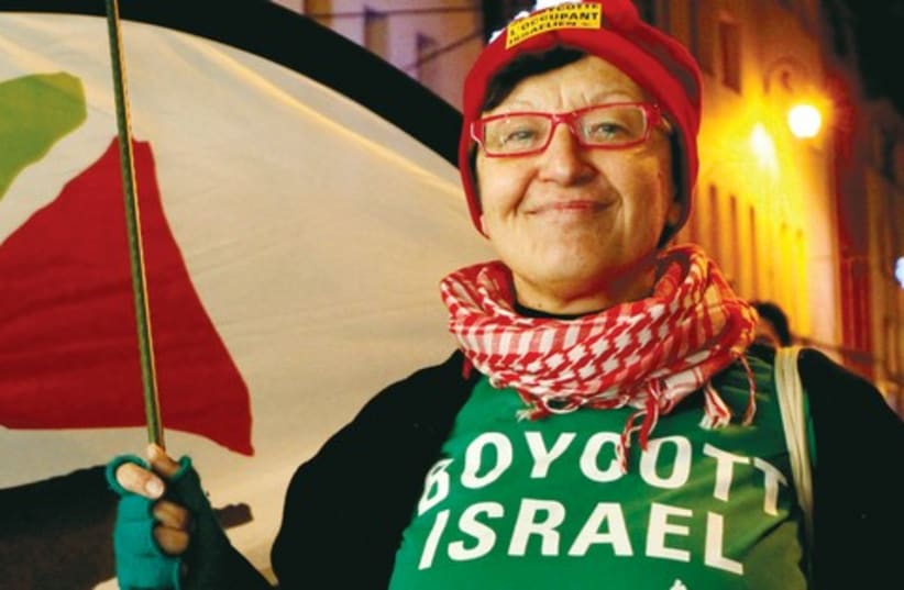 Woman in boycott Israel shirt (photo credit: Reuters)