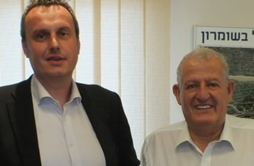 Ambassador Pojar (left) with President of Ariel University Yehuda Danon (photo credit: Courtesy- Ariel University)