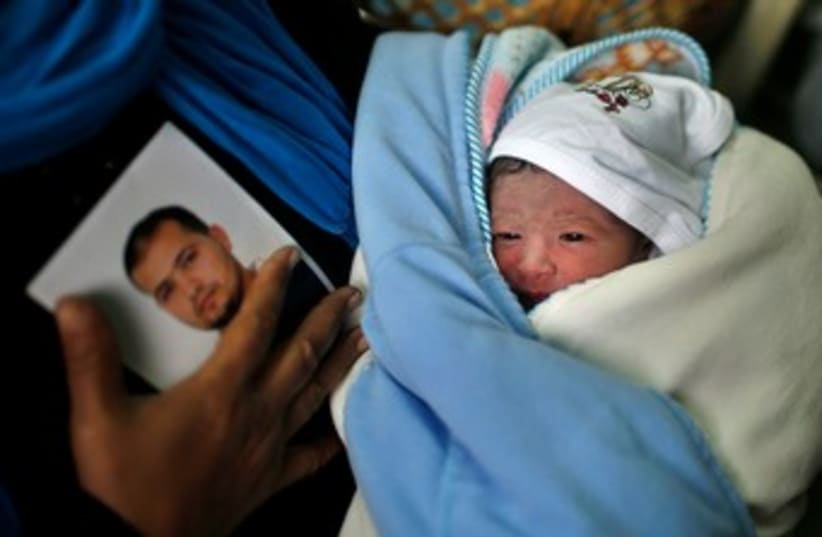 Palestinian baby Al-Hassan, who was conceived with smuggled sperm of Palestinian prisoner in Israeli jail. (photo credit: REUTERS)