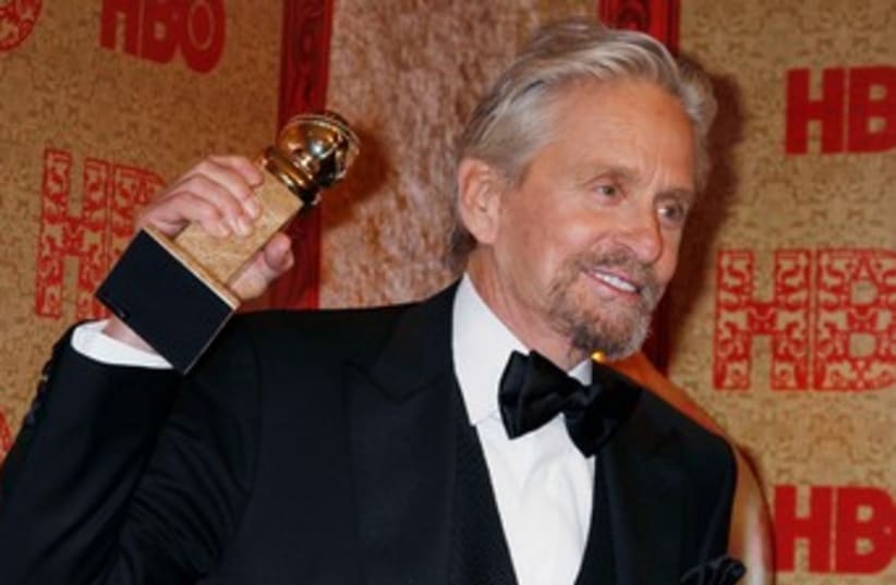 Michael Douglas poses with his Golden Globe. (photo credit: reuters)
