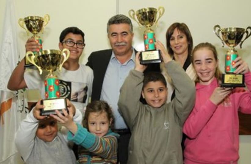 A recycling award was presented to students from various schools that excelled in recycling.  (photo credit: Yoni Reif)