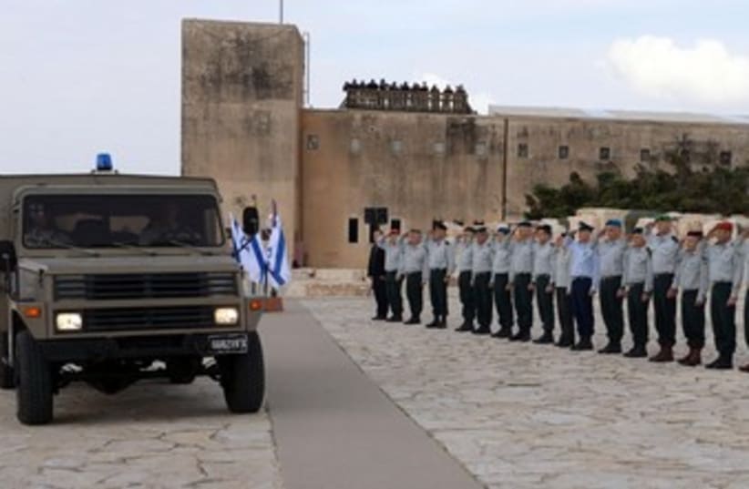 Ariel Sharon's coffin makes a stop at Yad Lashiryon, the Armored Corps Memorial, on its way to his final resting place, January 13, 2014. (photo credit: IDF Spokesman)