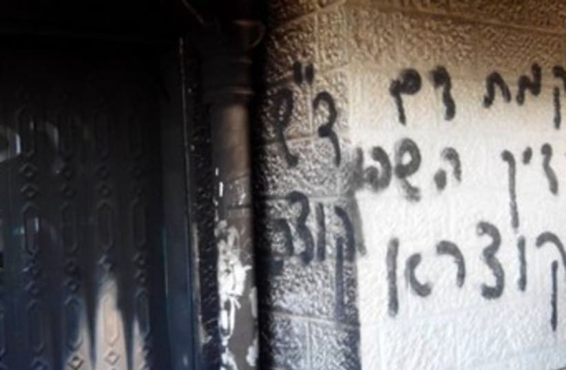 The damage from an attempted arson at a mosque in West Bank (photo credit: Courtesy Rabbis for Human Rights)