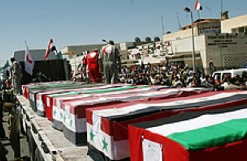 coffins syria 224 88 (photo credit: AP)