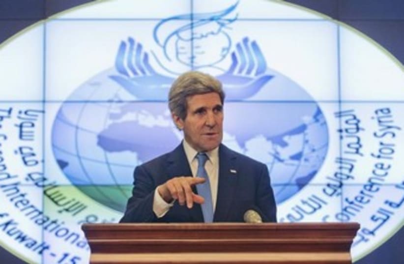 US Secretary of State John Kerry speaks to the press in Kuwait (photo credit: Reuters)