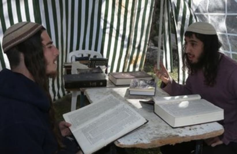 Studying Torah in Homesh, January 14, 2014 (photo credit: MARC ISRAEL SELLEM/THE JERUSALEM POST)