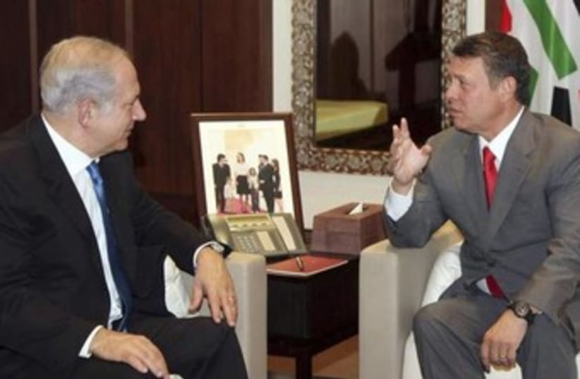 Jordan's King Abdullah meets with Israel's Prime Minister Benjamin Netanyahu at the Royal Palace in Amman July 27, 2010 (photo credit: REUTERS)