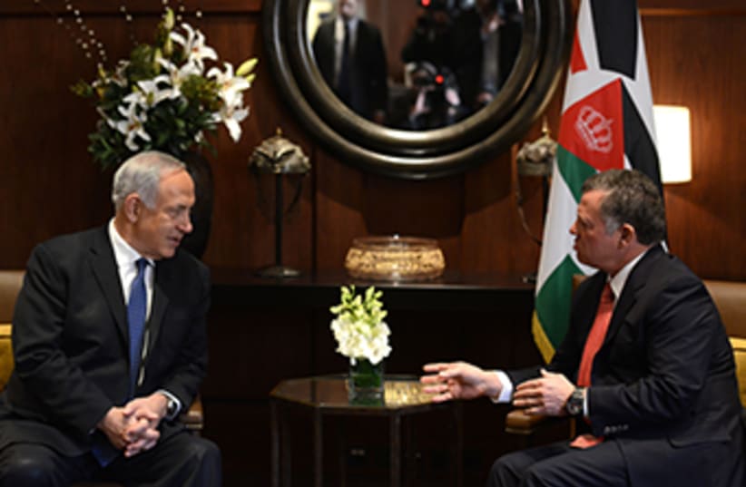 Binyamin Netanyahu and King Abdullah in Jordan Jan 16 2014 (photo credit: Yossi Ben David)