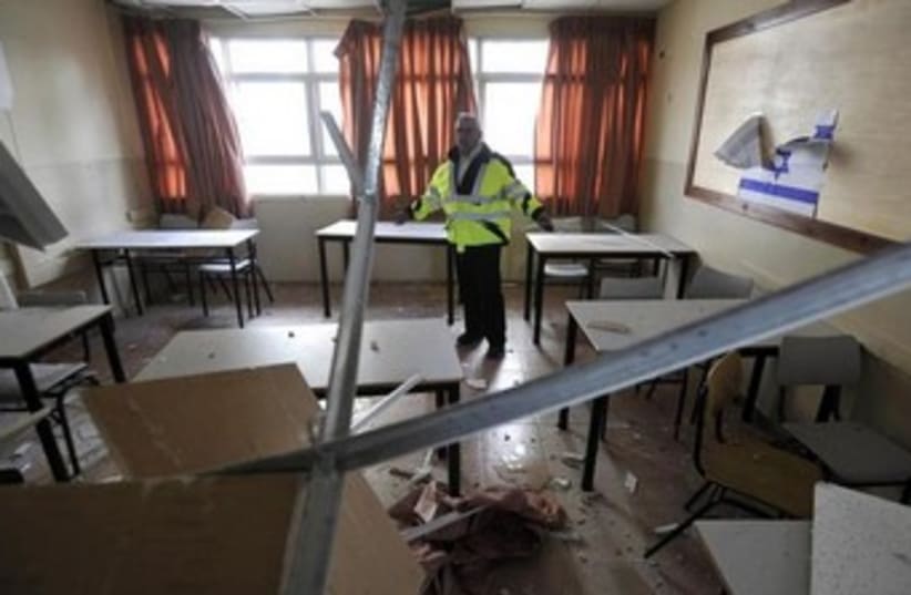 Damage in a classroom from a rocket in Ashkelon, February 28, 2009. (photo credit: REUTERS)