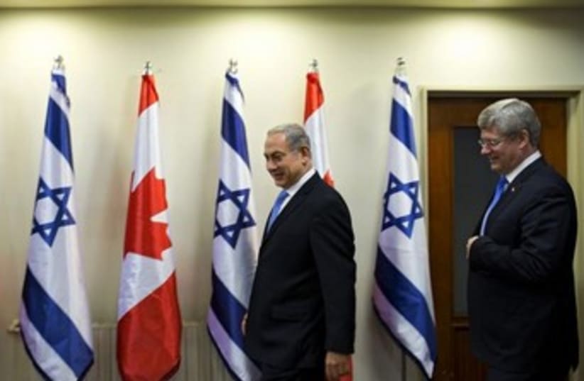 Prime Minister Binyamin Netanyahu and Canada's Prime Minister Stephen Harper in Jerusalem, January 21, 2014. (photo credit: REUTERS)