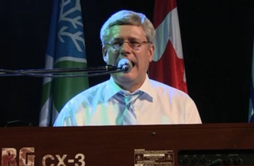 PM of Canada Harper Singing on Stage (photo credit: GPO)