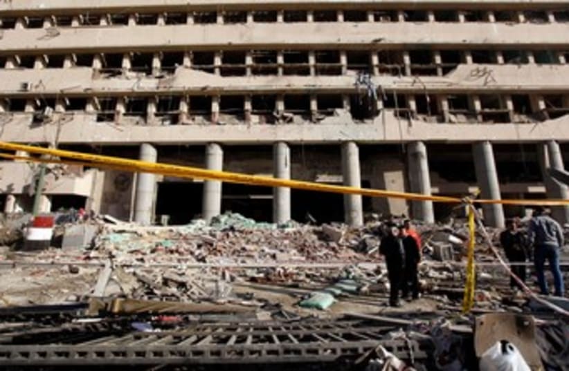 Cairo bombing destroyed building Jan 24 2014 (photo credit: REUTERS)