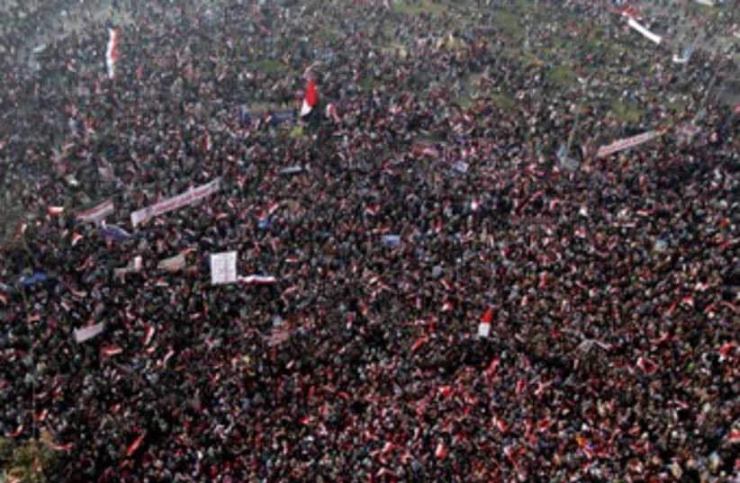 Protest in Tahrir, Cairo, Jan. 25 2014 (photo credit: REUTERS)
