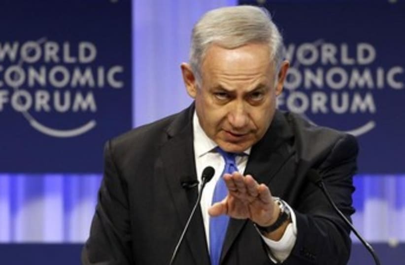 Prime Minister Binyamin Netanyahu speaking at the World Economic Forum in Davos, January 23, 2014. (photo credit: REUTERS)