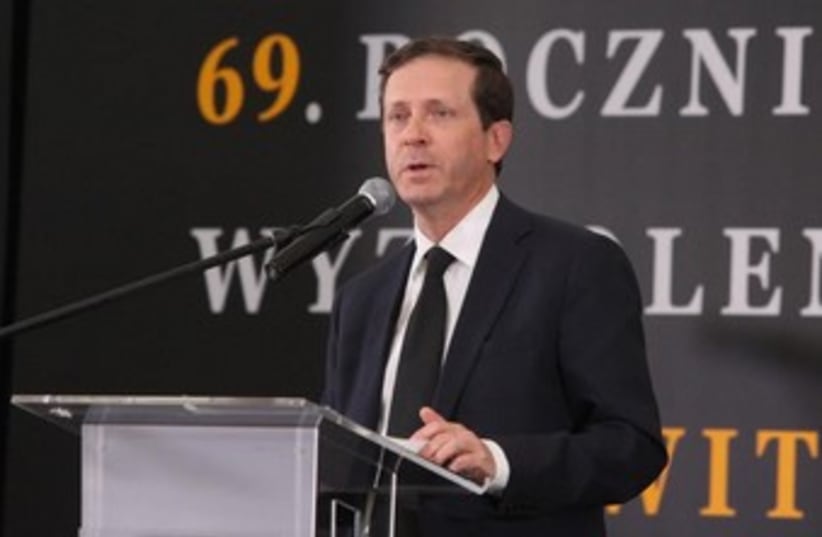 Opposition leader Isaac Herzog speaks at Auschwitz-Birkenau on Int'l Holocaust Remembrance Day. (photo credit: KNESSET)
