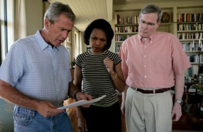 Former US president George W. Bush meets with his Secretary of State Condoleezza Rice and his National Security Advisor Stephen Hadley at the Bush Ranch to discuss the Middle East. (photo credit: Wikimedia Commons)