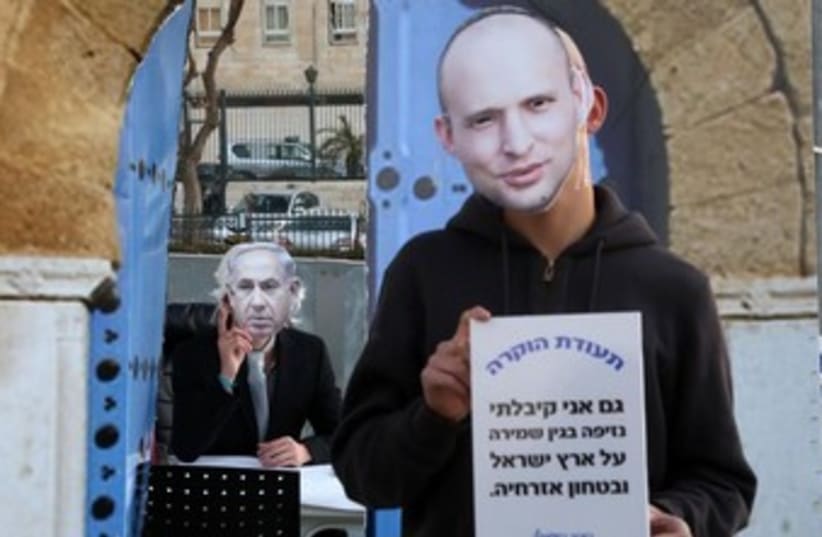 A Bennett vs. Netanyahu masks demostration. (photo credit: MARC ISRAEL SELLEM/THE JERUSALEM POST)