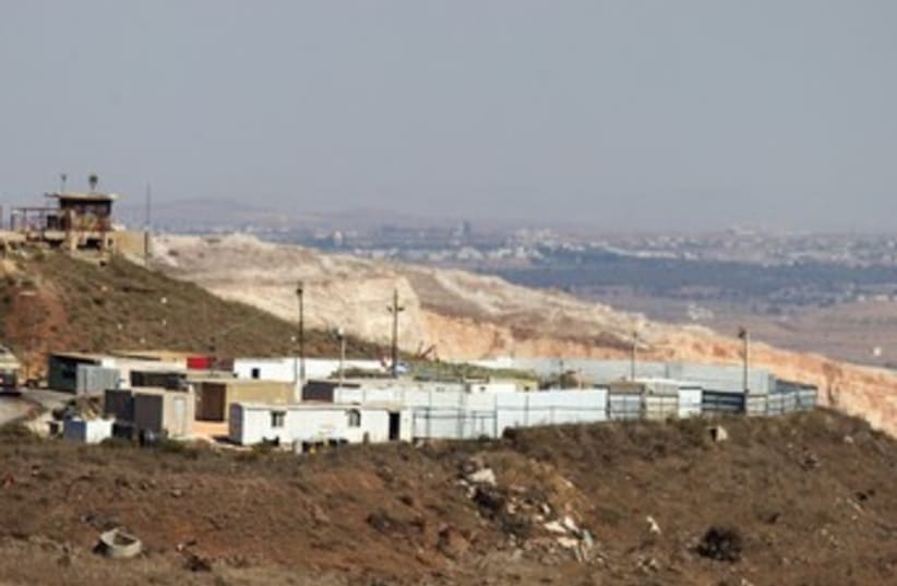 WOUNDED SYRIANS are treated at this Israeli field hospital on the Golan Heights. (photo credit: REUTERS)