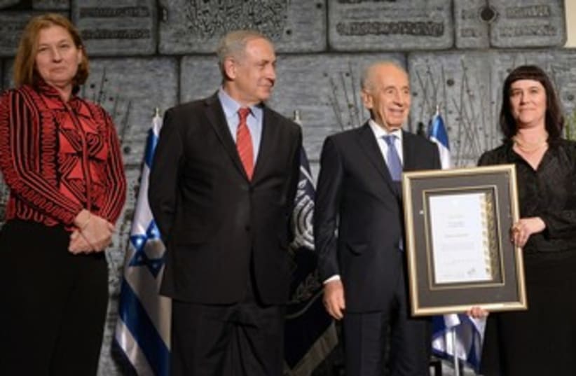 PM Binyamin Netanyahu, President Shimon Peres and Tzipi Livni fight against human trafficking.  (photo credit: Mark Neiman/GPO)